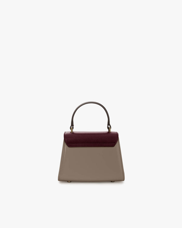 Sac ALEXIA NANO Colourblock Stratum de face, poignée rigide, rabat bordeaux et corps taupe