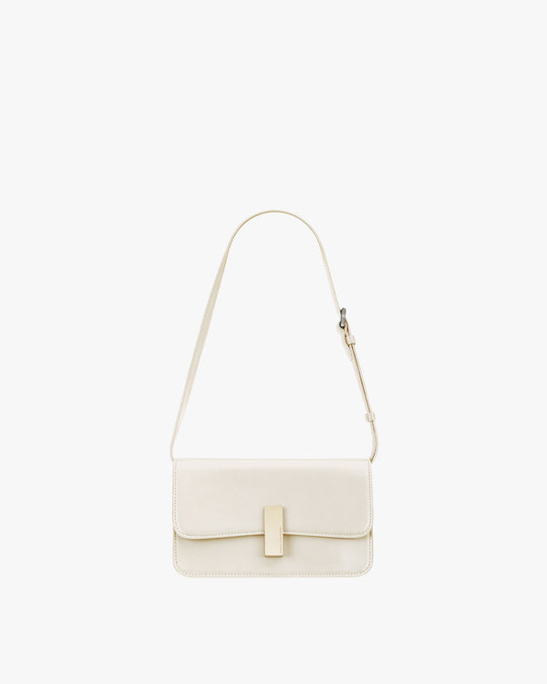 BLAKE bag in Ivory, front view, gold rectangular clasp, thin strap arched above