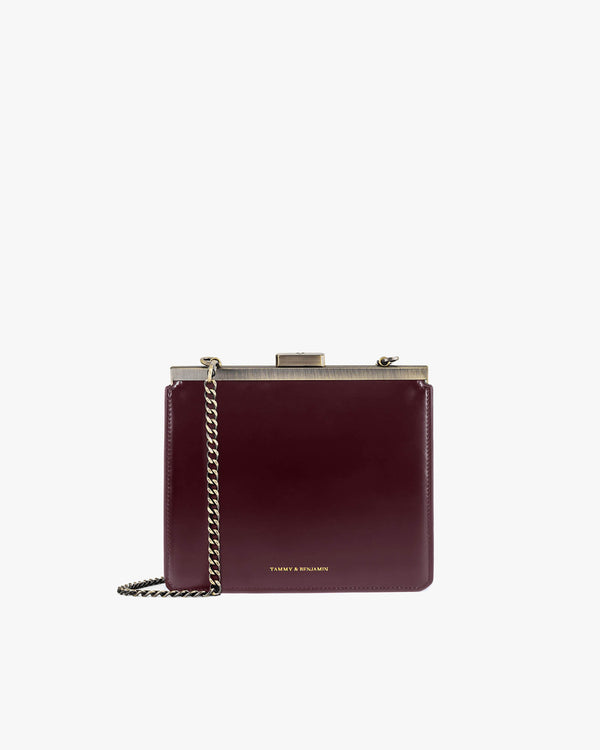 JEANNE bag in Mahogany, front view, gold metal clasp with detachable chain strap