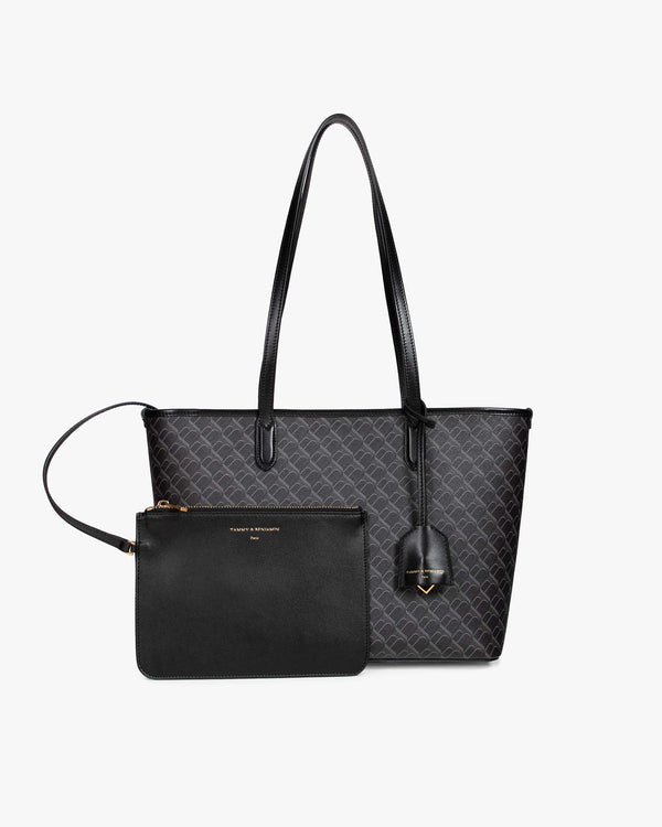 TOTE MONOGRAM PM noir, vue de face avec pochette amovible posée devant, anses plates