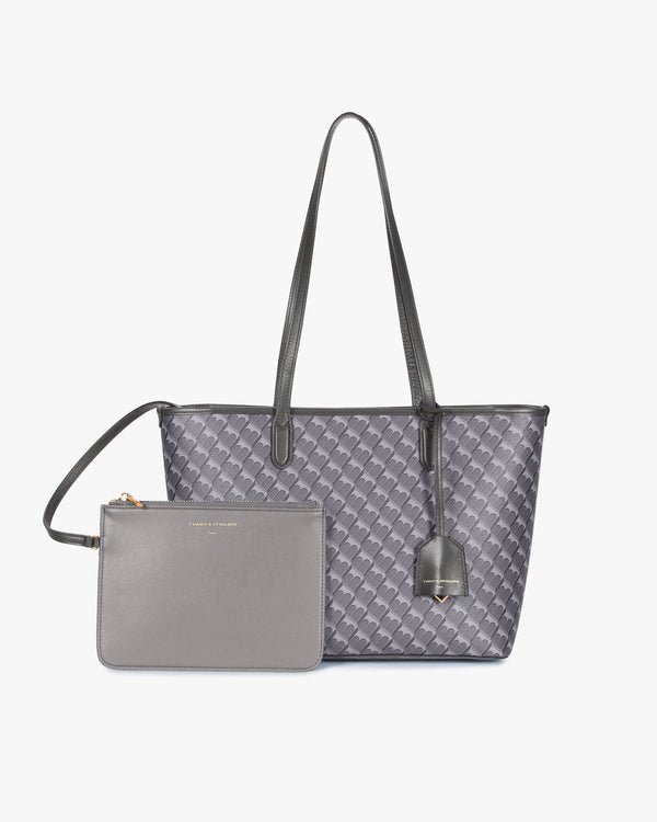 TOTE MONOGRAM PM gris, vue de face avec pochette amovible assortie posée devant