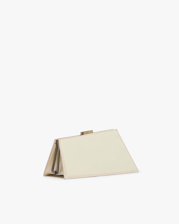 JAY bag in ivory, side view, standing open flat showing the gold clasp and interior