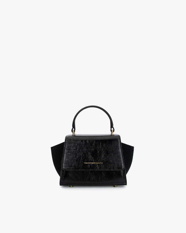 Sac ALEXIA NANO noir naplak de face, poignée gainée, ailes latérales et fermoir rabat visibles