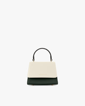 Sac ALEXIA NANO Colourblock Canopé vu de face, rabat crème et corps vert foncé, poignée noire rigide