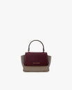 Sac ALEXIA NANO Colourblock Stratum, vue de face, poignée rigide, posé sur fond blanc