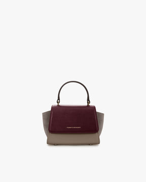 Sac ALEXIA NANO Colourblock Stratum, vue de face, poignée rigide, posé sur fond blanc