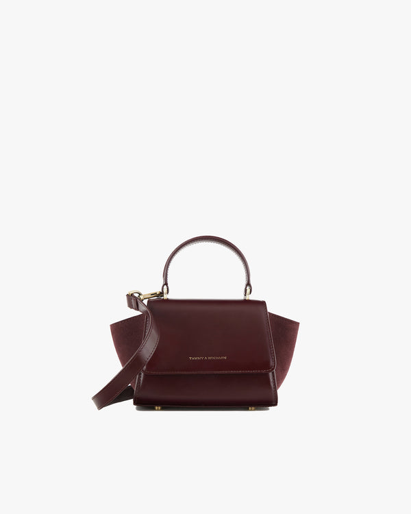 Sac ALEXIA NANO Mahogany de face, poignée rigide, ailes latérales déployées, bandoulière détachée