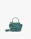 Sac ALEXIA NANO en turquoise, vue de face, posé, avec anse courte et bandoulière détachée