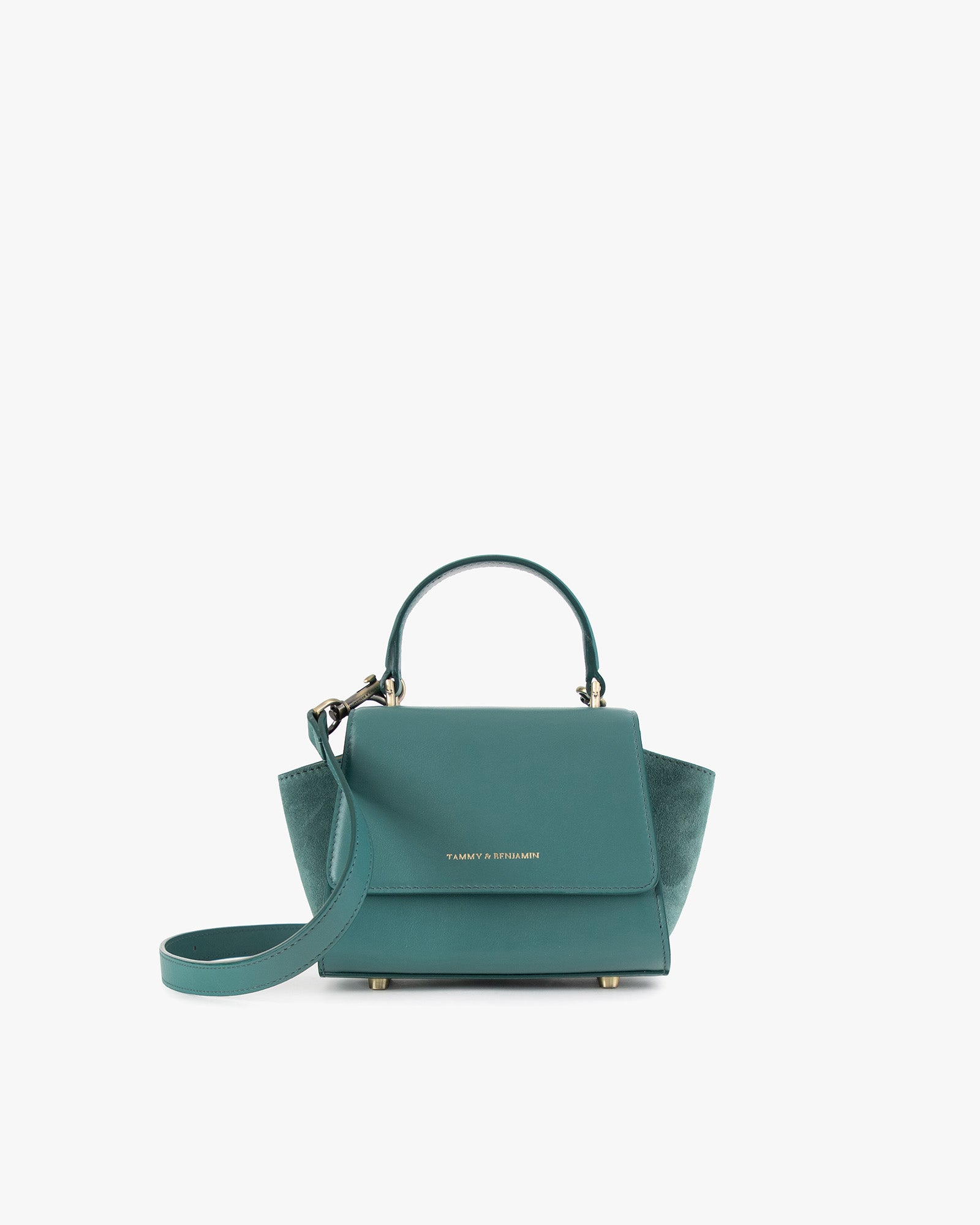 Sac ALEXIA NANO en turquoise, vue de face, posé, avec anse courte et bandoulière détachée