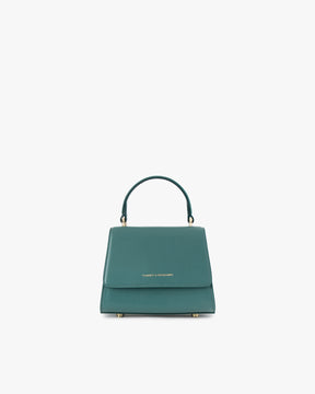 Sac ALEXIA NANO turquoise, vue de face, posé, anse courte relevée