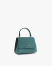 Sac ALEXIA NANO turquoise, vue de trois quarts, anse courte, posé sur fond blanc