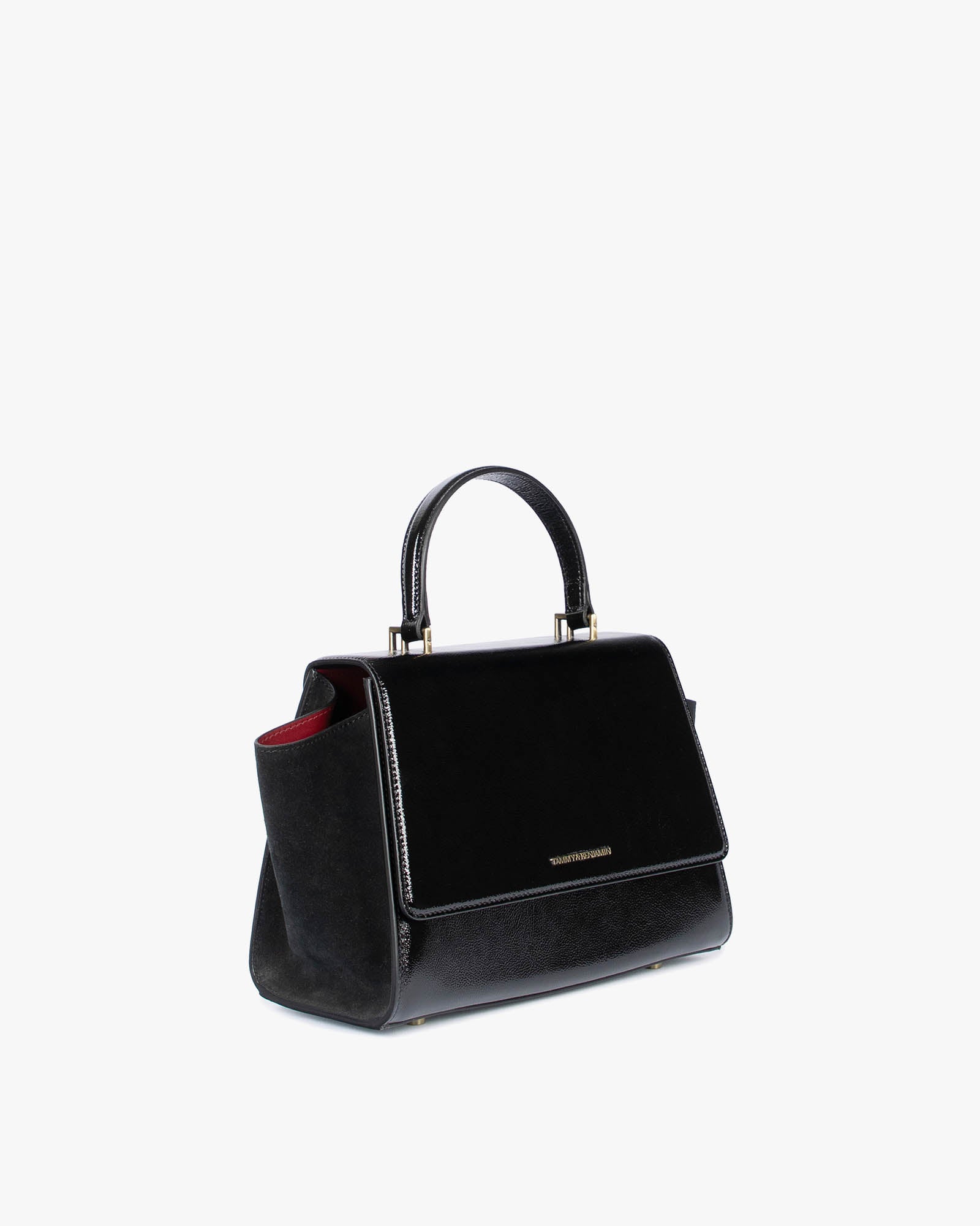 ALEXIA black naplak, three-quarter back view, side wing tucked in, top handle and gold logo visible