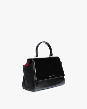 ALEXIA black naplak, three-quarter back view, side wing tucked in, top handle and gold logo visible
