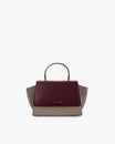 ALEXIA bag in Colourblock Stratum, front view, top handle, side wings and burgundy flap