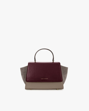 ALEXIA bag in Colourblock Stratum, front view, top handle, side wings and burgundy flap