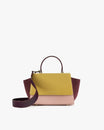 Sac ALEXIA Colourblock Vesper de face, poignée haute et bandoulière amovible posée au sol