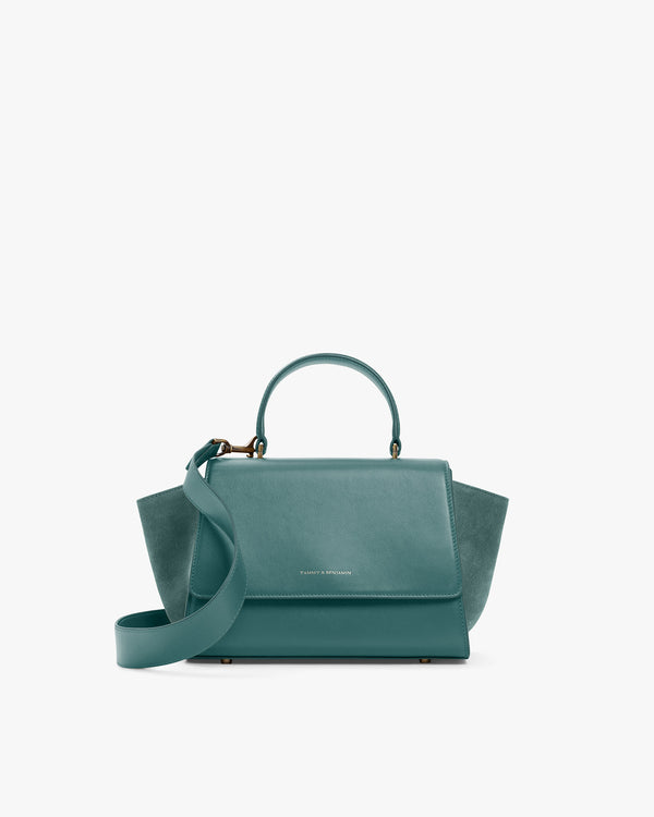 Sac ALEXIA turquoise de face, rabat fermé, anses rentrées, poignée et bandoulière détachée