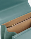 Sac ALEXIA Turquoise, vue intérieure, rabat ouvert sur doublure beige et poche zippée
