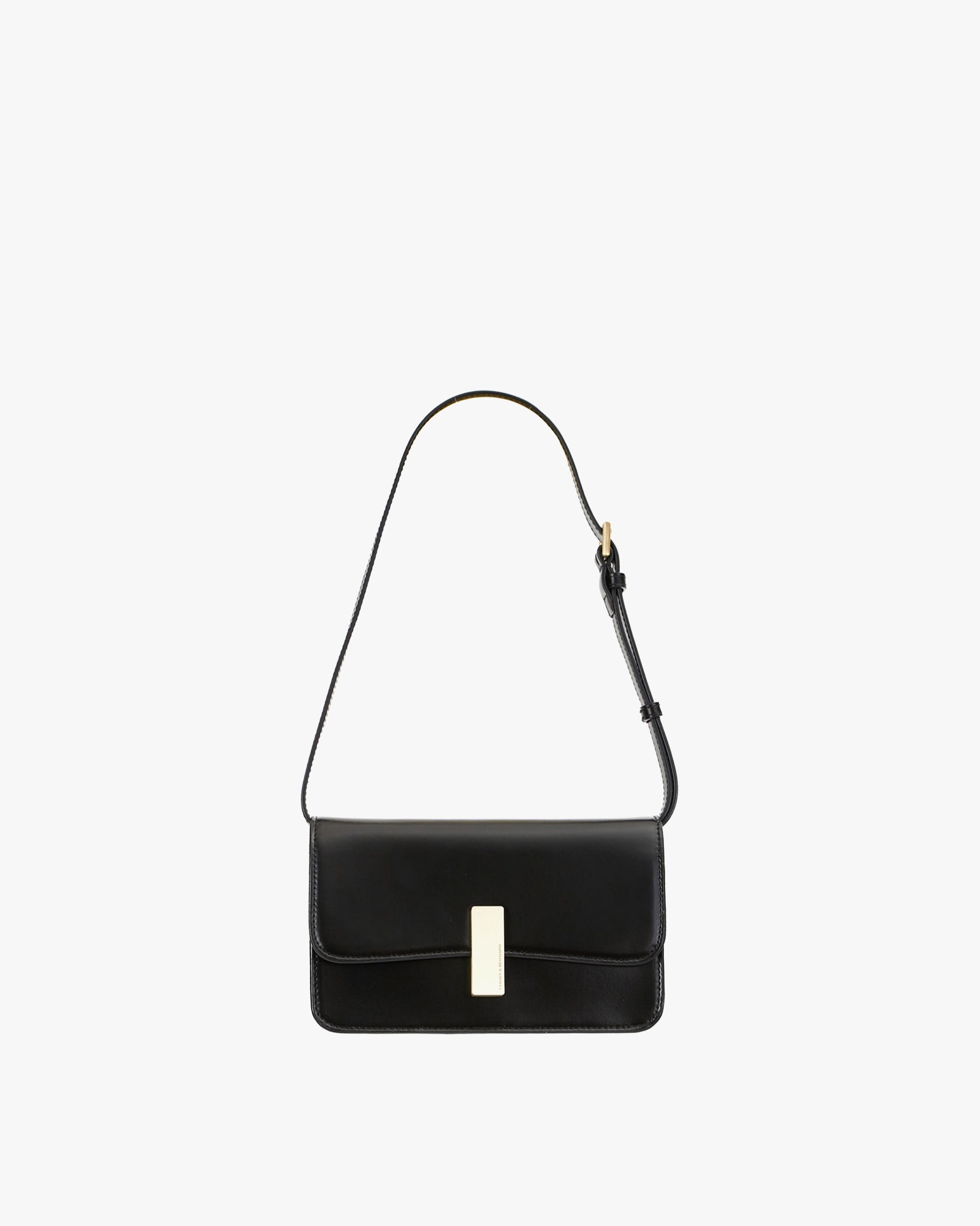 BLAKE bag in Black, front view, resting, with gold rectangular clasp and thin adjustable strap