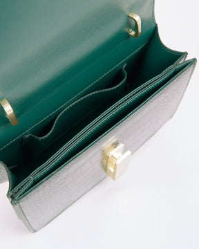 Sac BLAKE vert embossé crocodile, vue intérieure ouverte sur les compartiments et le fermoir doré
