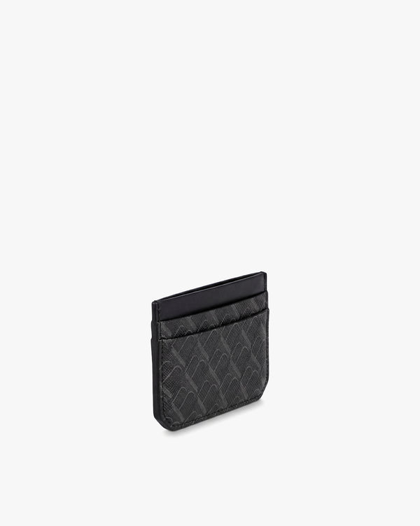 Porte-cartes CARDY noir monogram, vue de trois-quarts posée, toile Marble Arch et cuir nappa