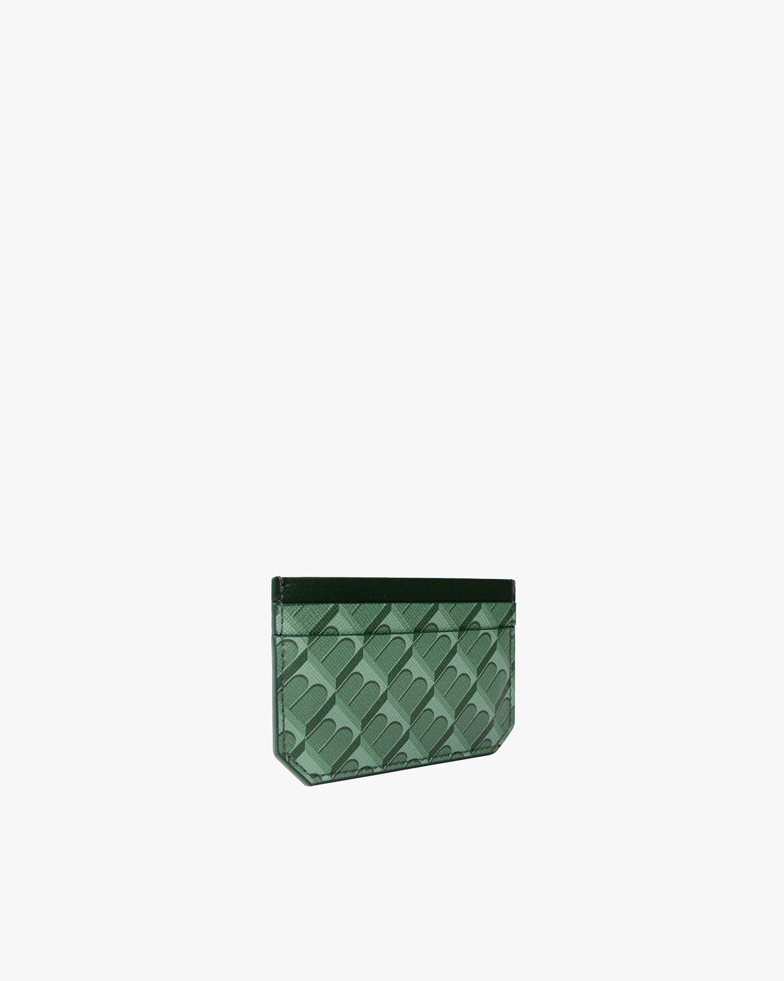 Porte-cartes CARDY vert monogram, vue de trois quarts posée, motif architectural visible