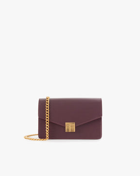 ELEANOR bag in Aubergine, front view, standing, with gold Marble Arch clasp and removable chain