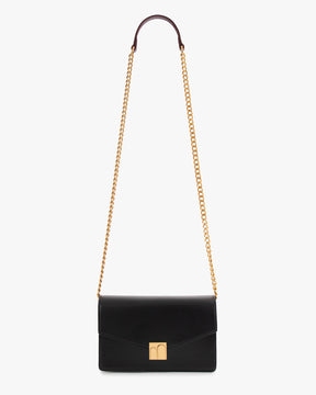 Sac ELEANOR noir de face, fermoir Marble Arch doré, chaîne amovible avec repose-épaule bordeaux