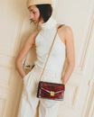 Sac ELEANOR Marbre porté en bandoulière, chaîne dorée et repose-épaule en cuir, vue de face