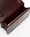 Sac ELEANOR Marbre ouvert, vue intérieure sur porte-cartes, poche zippée et fermoir doré