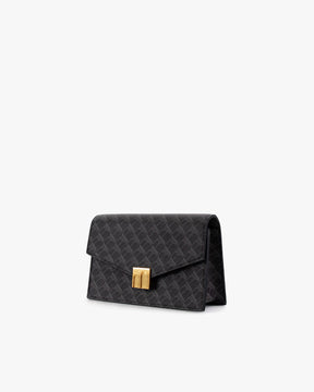 ELEANOR bag in black monogram, three-quarter view, gold Marble Arch clasp, standing
