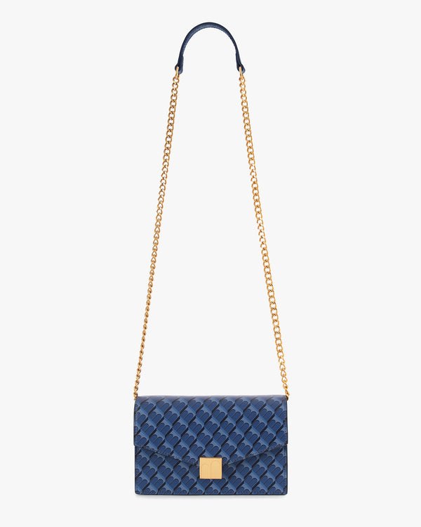 Sac ELEANOR Bleu avec chaîne amovible et repose-épaule en cuir, porté en bandoulière