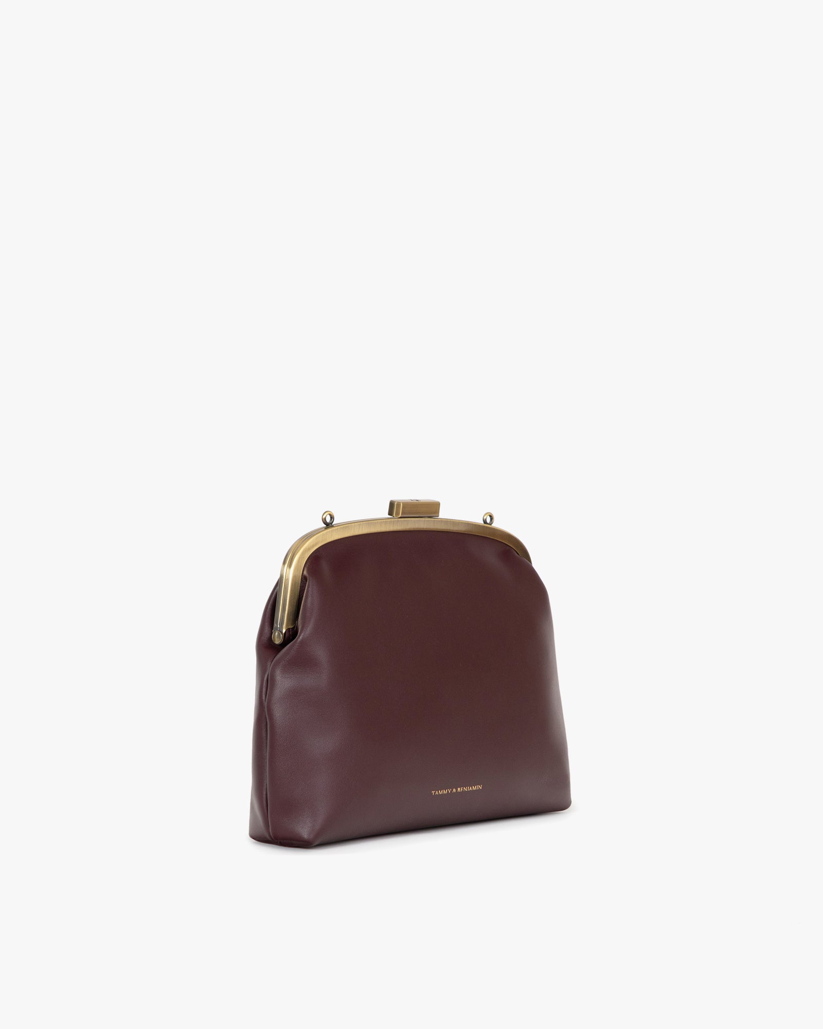 Sac EMMA Aubergine vu de trois quarts, fermoir cadenas doré, sans bandoulière