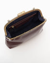 Sac EMMA Aubergine ouvert, vue intérieure sur doublure bleu marine, poche zippée et fermoir doré