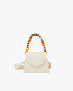GABRIELLE bag in Ivory, front view, standing, with short amber chain handle and leather strap
