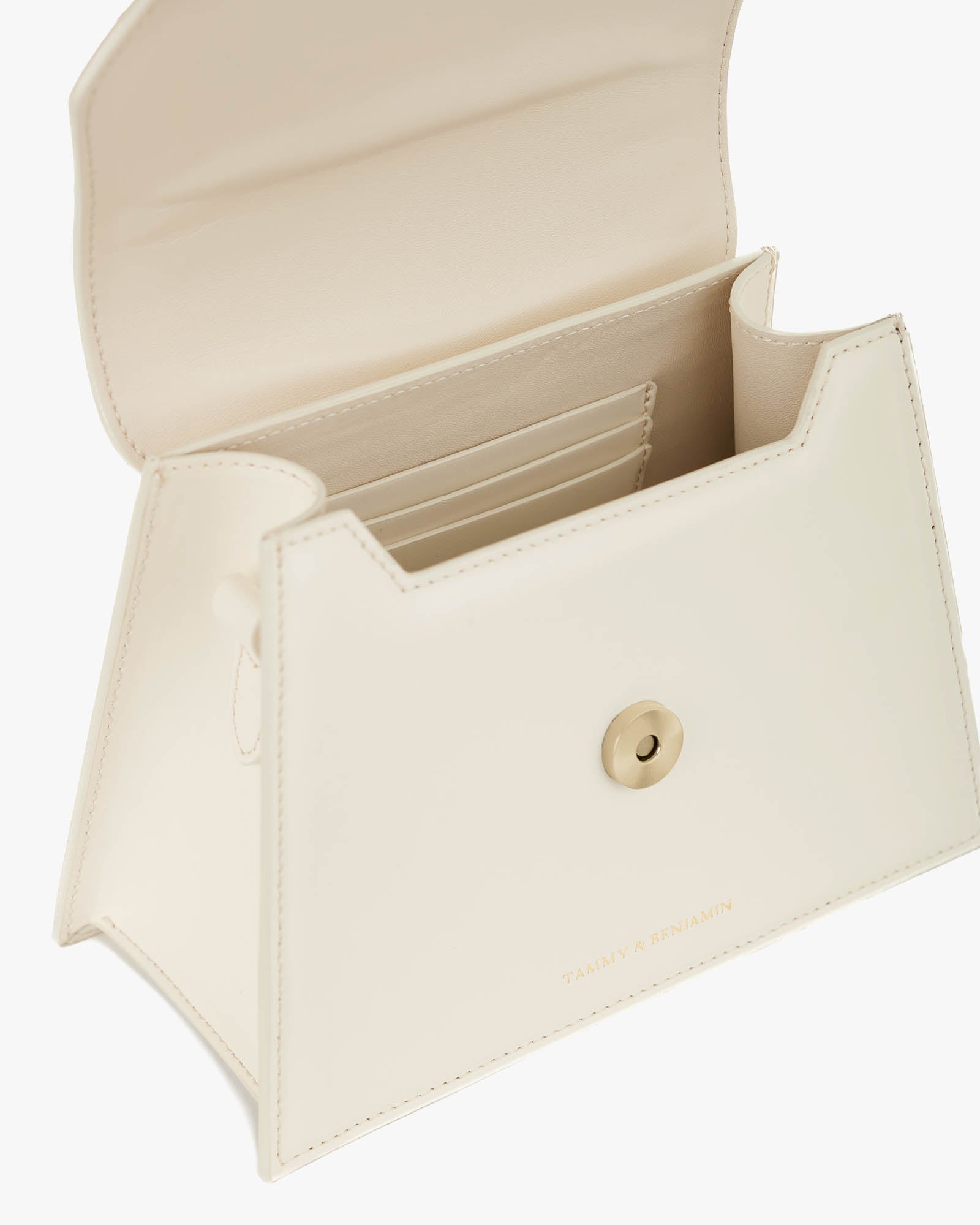 GABRIELLE bag in Ivory, open view showing the card holder and snap button closure