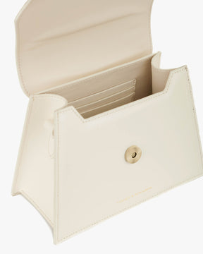 GABRIELLE bag in Ivory, open view showing the card holder and snap button closure