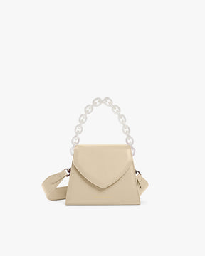 Sac GABRIELLE beige de face, anse chaîne translucide et bandoulière en cuir ajustable