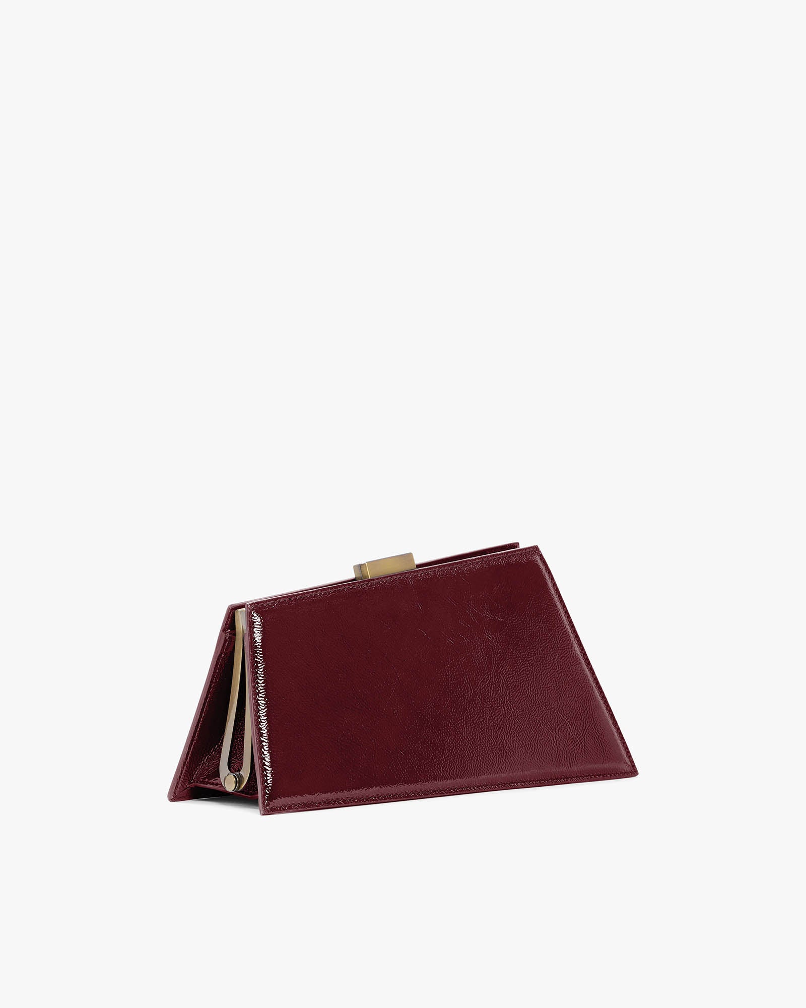 JAY bag in bordeaux naplak, side view standing, metal clasp visible