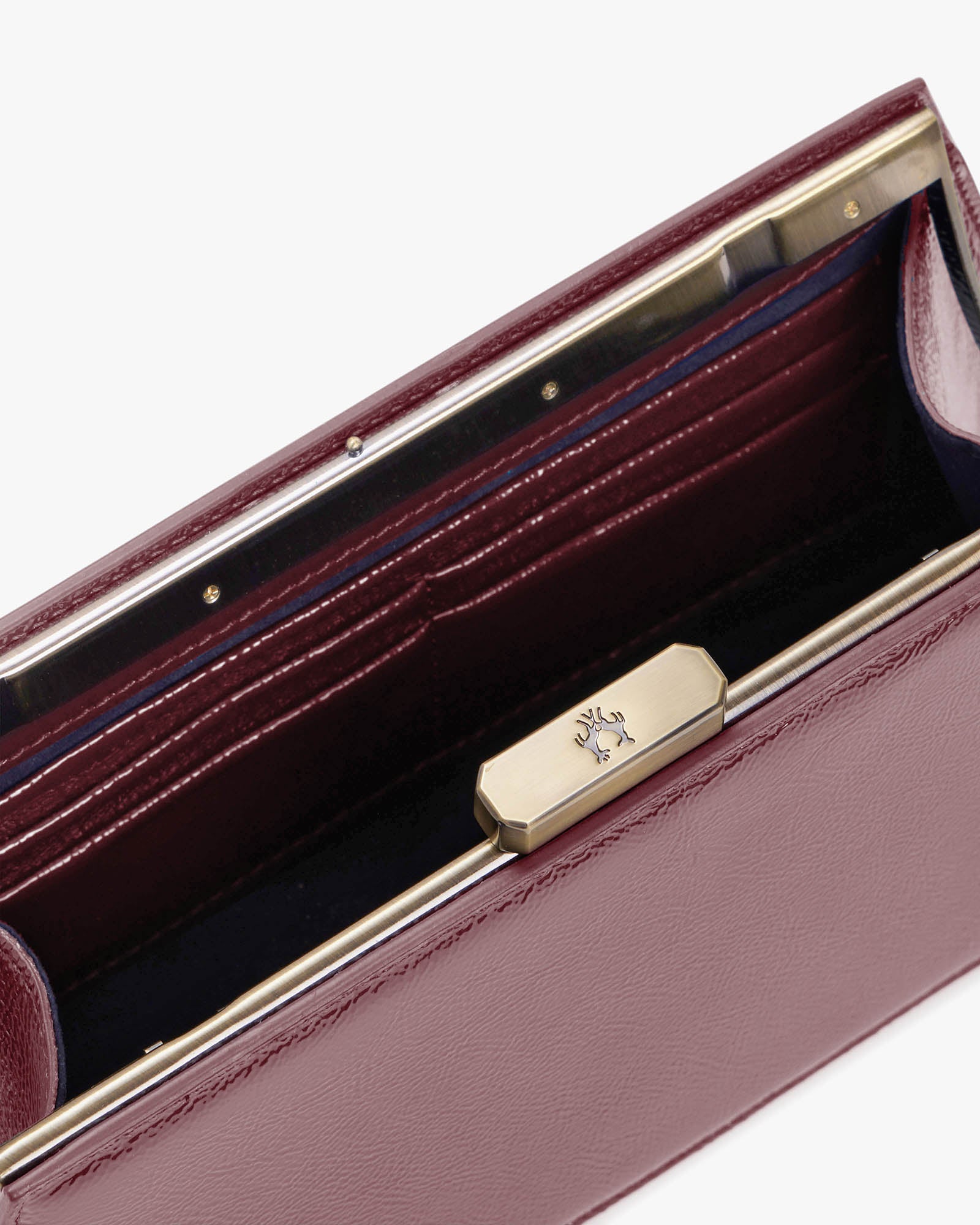 JAY bag in Bordeaux naplak, open interior view, showing card slots and gold clasp detail