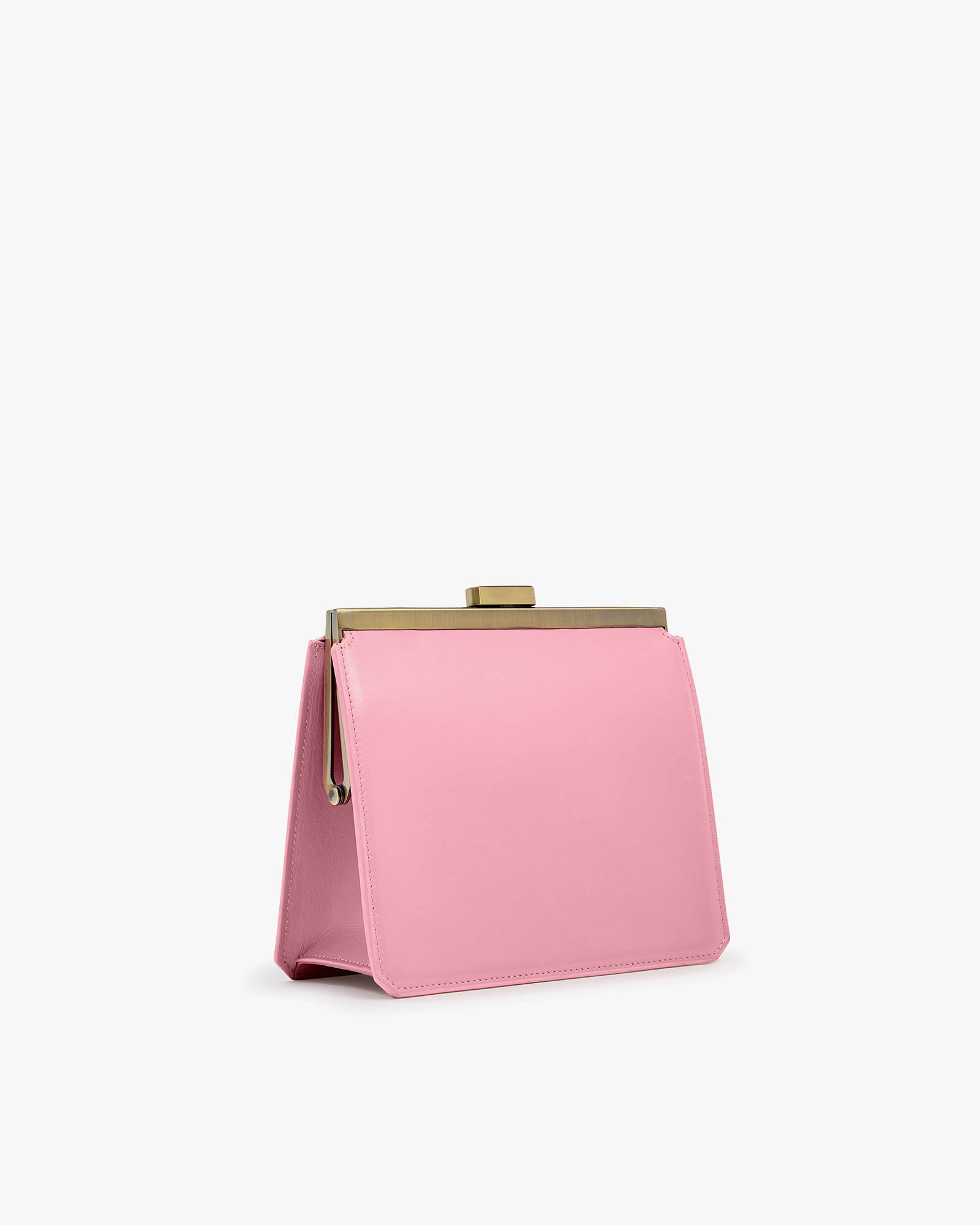 Sac JEANNE Blush vue de trois quarts, fermoir métallique doré, posé sans anse