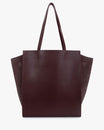 Sac cabas LEXI GM Aubergine de face, anses portées, ailes en cuir et panneaux en suède