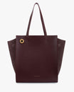 Cabas LEXI GM Aubergine de face, anses longues et œillet doré, ailes en cuir et suède