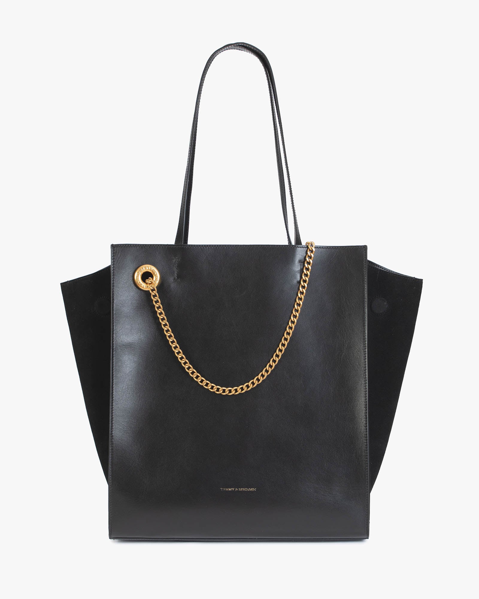 Sac LEXI GM noir de face, posé, anses portées, chaîne amovible dorée sur le devant, panneaux latéraux en suède