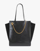 Sac LEXI GM noir de face, posé, anses portées, chaîne amovible dorée sur le devant, panneaux latéraux en suède