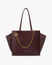 Sac LEXI MM Aubergine de face, cuir et suède, chaîne amovible dorée, anses portées à l'épaule