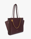 Sac LEXI MM Aubergine de trois quarts, ailes en cuir et panneaux en suède, chaîne dorée amovible