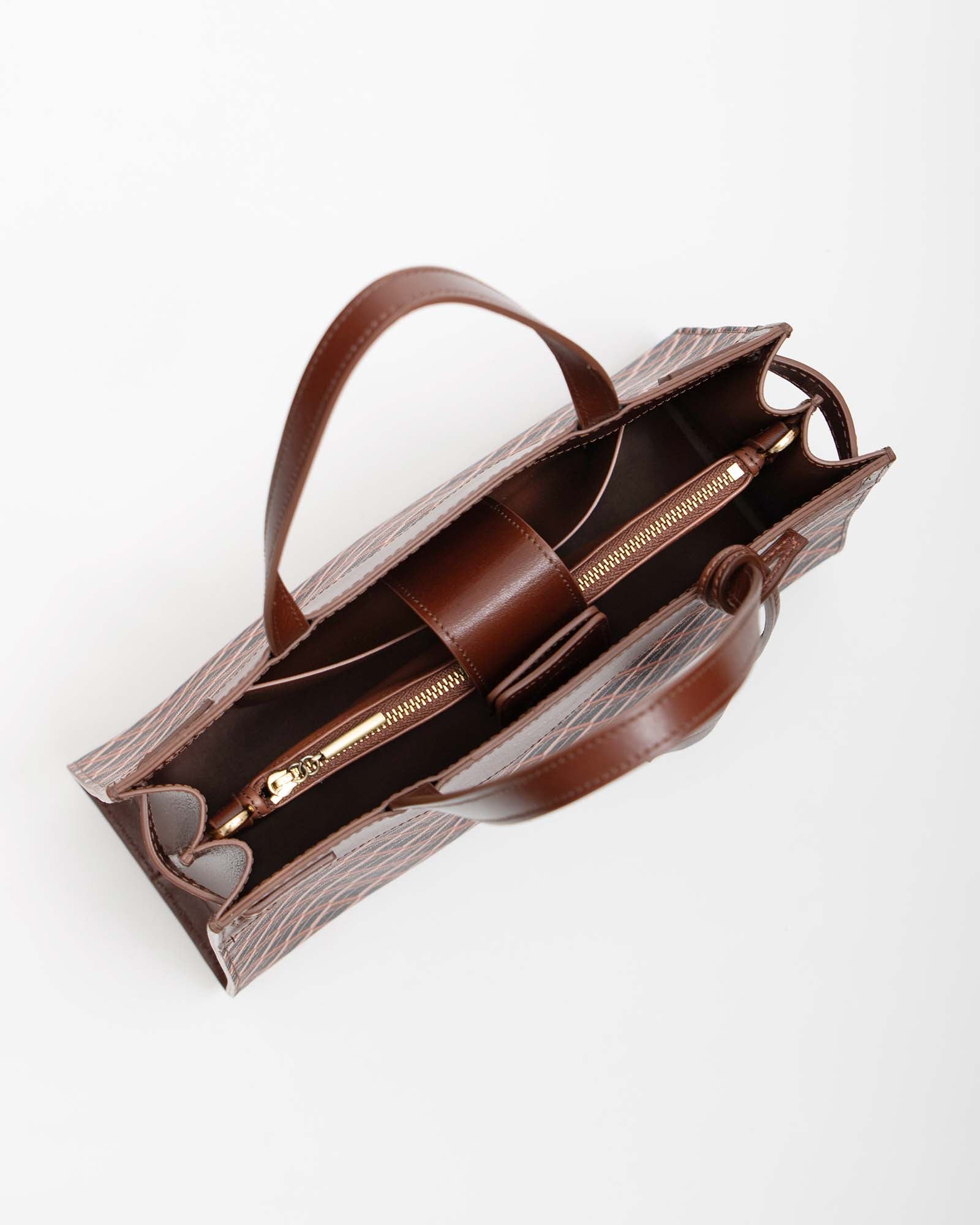 MADISON bag in brown monogram, top view open, interior with central zip pocket