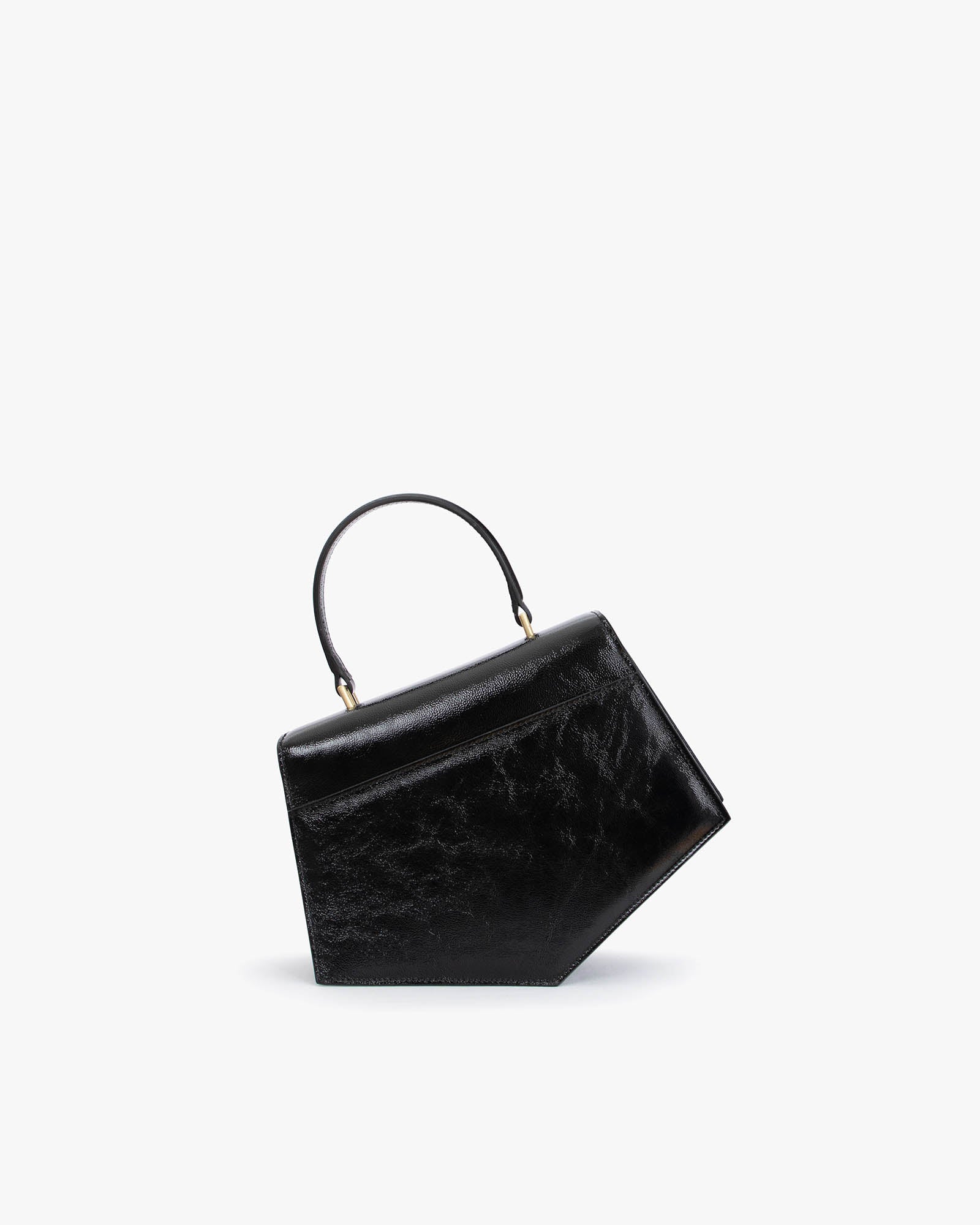Sac PENTAGONE noir naplak de profil, posé, avec poignée structurée relevée