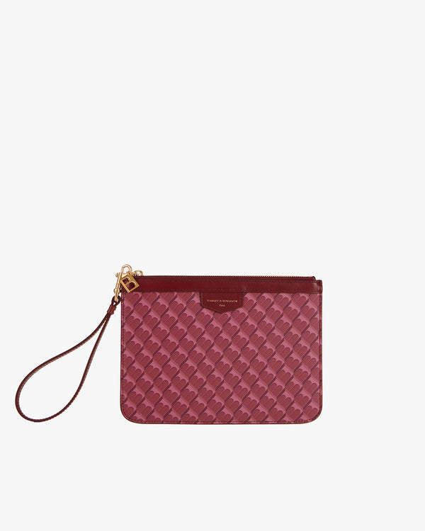 POCHETTE PM MONOGRAM Bordeaux, vue de face avec dragonne en cuir, en toile enduite Marble Arch